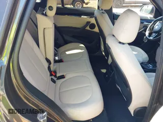 2016 BMW X1 xDrive28i with VIN WBXHT3C31G5E47828, listed as a IAAI auction lot 42592338 with 91,927 mi miles and . Bid and sale history available at DreamBid. Image 8.