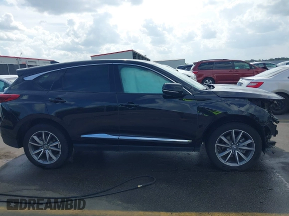 2020 Acura RDX w/Technology Pkg with VIN 5J8TC1H57LL002097, listed as a IAAI auction lot 41957752 with 60,945 mi miles. Bid and sale history available at carsss.com. Image 13.