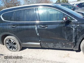2019 Hyundai Santa Fe Ultimate with VIN 5NMS5CAA6KH075047, listed as a IAAI auction lot 41802407 with 119,063 mi miles and . Bid and sale history available at DreamBid. Image 13.