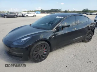 2023 Tesla Model 3 Performance with VIN 5YJ3E1ECXPF693419, listed as a Copart auction lot 49379795 with 36,652 mi miles and Salvage Title. Bid and sale history available at carsss.com. Image 1.