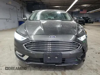 2017 Ford Fusion Titanium z VIN 3FA6P0SU3HR209563, wystawiony jako Copart lot #52039915 z przebiegiem 119 961 mil mil oraz Szkoda całkowita • Salvage title. Historia ofert i sprzedaży dostępna na DreamBid. Obrazek 5.