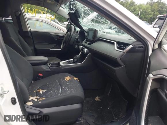 2019 Toyota RAV4 Hybrid LE with VIN JTMMWRFV9KD021285, listed as a IAAI auction lot 42757660 with 74,870 mi miles and . Bid and sale history available at DreamBid. Image 5.