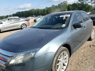 2012 Ford Fusion SEL z VIN 3FAHP0JA9CR333944, wystawiony jako Copart lot #56907605 z przebiegiem 180 386 mil mil oraz Szkoda całkowita • Salvage title. Historia ofert i sprzedaży dostępna na DreamBid. Obrazek 14.