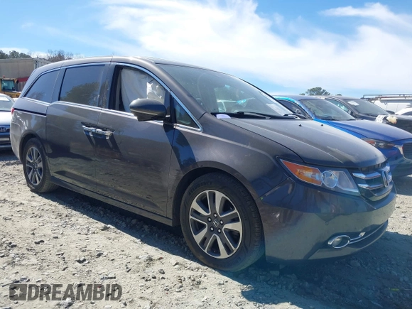 2014 Honda Odyssey Touring with VIN 5FNRL5H92EB016546, listed as a IAAI auction lot 41689148 with 143,601 mi miles and . Bid and sale history available at DreamBid. Image 13.