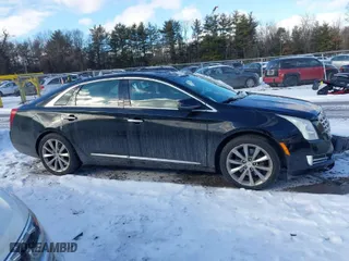 2013 Cadillac XTS Luxury with VIN 2G61R5S31D9106650, listed as a IAAI auction lot 41405091 with 143,545 mi miles. Bid and sale history available at carsss.com. Image 13.