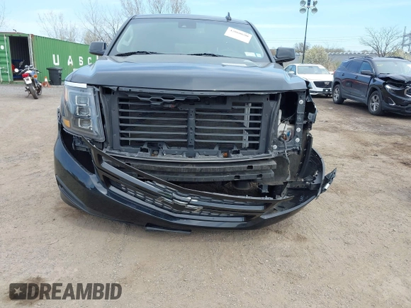 2017 Chevrolet Suburban LT with VIN 1GNSKHKCXHR194365, listed as a IAAI auction lot 42060690 with 213,424 mi miles and . Bid and sale history available at DreamBid. Image 17.