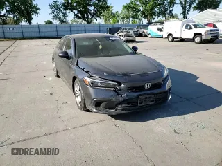2022 Honda Civic LX z VIN 2HGFE2F26NH517811, wystawiony jako Copart lot #52933645 z przebiegiem Nie podano mil oraz Szkoda całkowita • Salvage title. Historia ofert i sprzedaży dostępna na DreamBid. Obrazek 11.