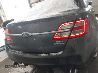 2015 Ford Taurus SEL with VIN 1FAHP2E89FG202589, listed as a IAAI auction lot 41592298 with 105,410 mi miles and . Bid and sale history available at carsss.com. Image 16.
