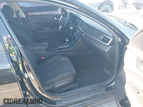 2017 Kia Optima LX with VIN 5XXGT4L30HG152700, listed as a IAAI auction lot 41826259 with 143,438 mi miles. Bid and sale history available at carsss.com. Image 5.