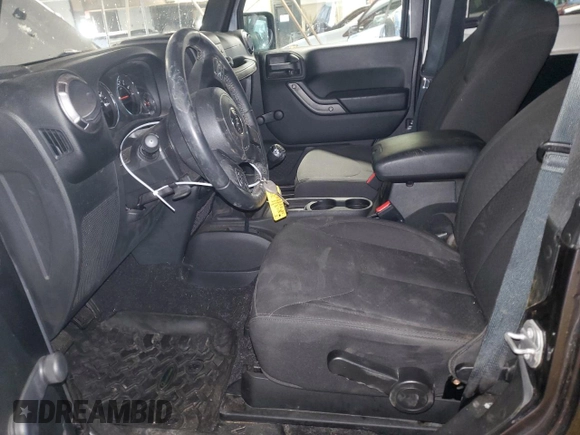 2017 Jeep Wrangler Willys Wheeler with VIN 1C4AJWAG3HL751703, listed as a Copart auction lot 88861635 with 14,114 mi miles and Salvage Title. Bid and sale history available at DreamBid. Image 7.
