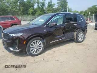2020 Cadillac XT6 FWD Premium Luxury z VIN 1GYKPCRS9LZ125843, wystawiony jako Copart lot #59959805 z przebiegiem 46 363 mil mil oraz Szkoda całkowita • Salvage title. Historia ofert i sprzedaży dostępna na DreamBid. Obrazek 1.
