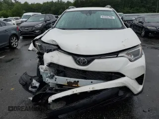 2018 Toyota RAV4 LE with VIN 2T3BFREV2JW853108, listed as a Copart auction lot 61245795 with 174,196 mi miles and Salvage title. Bid and sale history available at DreamBid. Image 5.