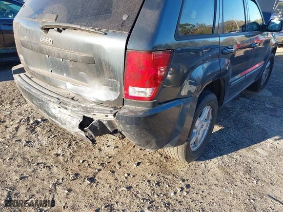 2007 Jeep Grand Cherokee Laredo with VIN 1J8GS48K17C655999, listed as a IAAI auction lot 41590500 with 290,695 mi miles. Bid and sale history available at carsss.com. Image 6.