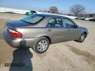 2001 Mazda 626 LX with VIN 1YVGF22C515232947, listed as a Copart auction lot 80978324 with 73,674 mi miles and Non Repairable. Bid and sale history available at carsss.com. Image 3.