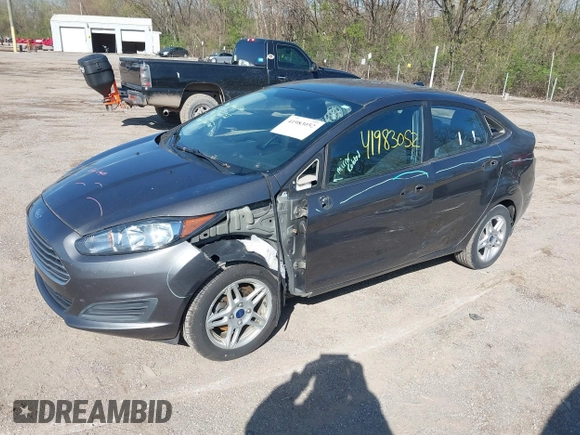 2017 Ford Fiesta SE with VIN 3FADP4BJ0HM117117, listed as a IAAI auction lot 41983052 with 99,186 mi miles. Bid and sale history available at carsss.com. Image 2.