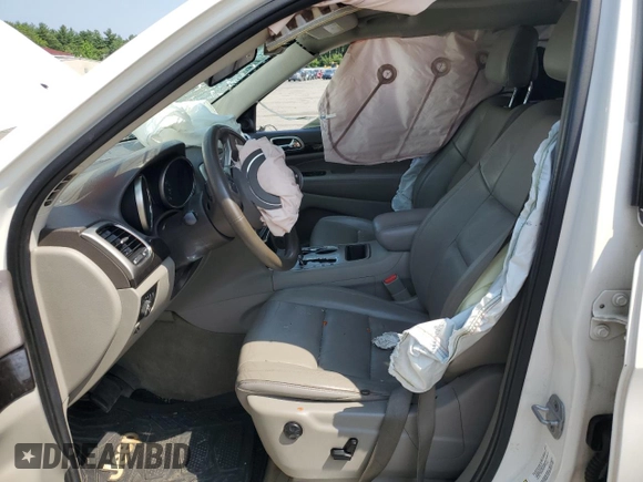 2011 Jeep Grand Cherokee Laredo with VIN 1J4RR4GG6BC657520, listed as a Copart auction lot 63558355 with 215,444 mi miles and Salvage title. Bid and sale history available at DreamBid. Image 7.