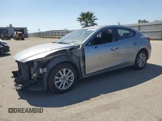 2014 Mazda 3 i Touring with VIN JM1BM1V71E1115569, listed as a Copart auction lot 50428315 with 139,265 mi miles and Salvage Title. Bid and sale history available at DreamBid. Image 1.