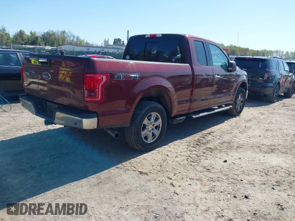 2015 Ford F-150 XLT with VIN 1FTEX1EP1FFC04227, listed as a IAAI auction lot 42048985 with 96,179 mi miles. Bid and sale history available at carsss.com. Image 4.