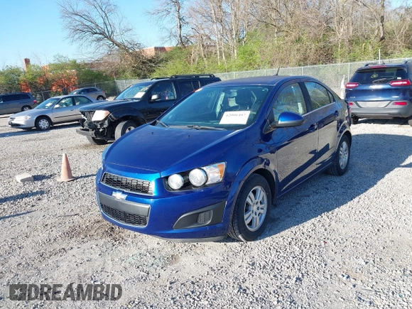 2014 Chevrolet Sonic LT with VIN 1G1JC5SH6E4164809, listed as a IAAI auction lot 42006407 with 105,710 mi miles and . Bid and sale history available at DreamBid. Image 2.