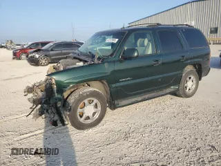 2002 GMC Yukon Denali z VIN 1GKEK63U52J273759, wystawiony jako Copart lot #47272905 z przebiegiem 148 109 mil mil oraz Szkoda całkowita • Salvage title. Historia ofert i sprzedaży dostępna na DreamBid. Obrazek 1.