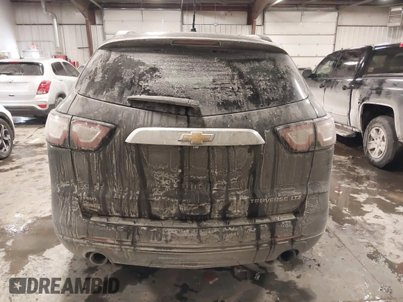 2015 Chevrolet Traverse LTZ with VIN 1GNKVJKD8FJ360899, listed as a IAAI auction lot 41634924 with 165,835 mi miles and . Bid and sale history available at DreamBid. Image 16.