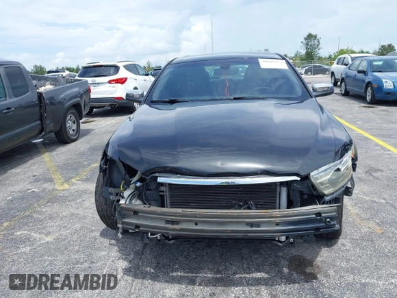 2013 Ford Taurus Limited with VIN 1FAHP2F84DG220283, listed as a IAAI auction lot 40045974 with 155,409 mi miles and . Bid and sale history available at DreamBid. Image 16.