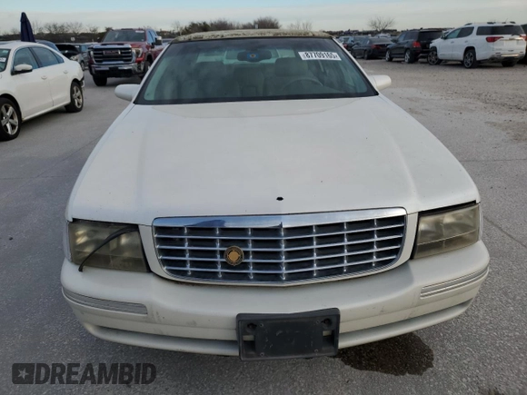 1999 Cadillac DeVille z VIN 1G6KD54Y8XU790082, wystawiony jako Copart lot #87709165 z przebiegiem 112 485 mil mil oraz Czysty tytuł • Clean title. Historia ofert i sprzedaży dostępna na DreamBid. Obrazek 5.