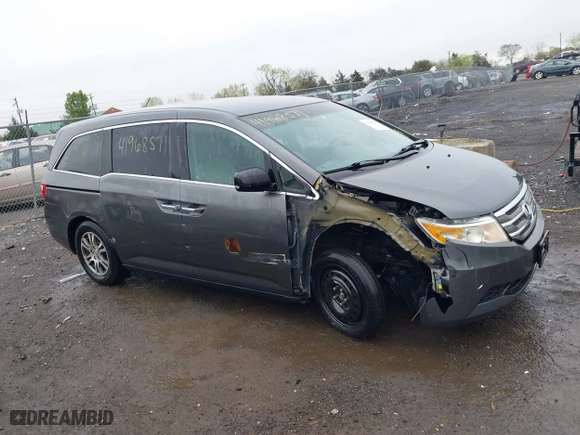 2012 Honda Odyssey EX with VIN 5FNRL5H49CB044488, listed as a IAAI auction lot 41968571 with 128,005 mi miles. Bid and sale history available at carsss.com. Image 13.