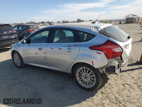 2014 Ford Focus Electric with VIN 1FADP3R45EL287285, listed as a Copart auction lot 74148154 with 64,543 mi miles and Salvage title. Bid and sale history available at DreamBid. Image 2.