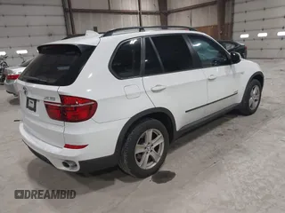 2012 BMW X5 35i z VIN 5UXZV4C54CL748257, wystawiony jako IAAI lot #42036669 z przebiegiem 122 438 mil mil oraz . Historia ofert i sprzedaży dostępna na DreamBid. Obrazek 4.