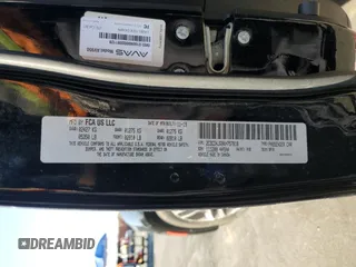 2019 Dodge Charger SXT with VIN 2C3CDXJG8KH757818, listed as a Copart auction lot 49518475 with 98,129 mi miles and Salvage Title. Bid and sale history available at DreamBid. Image 14.