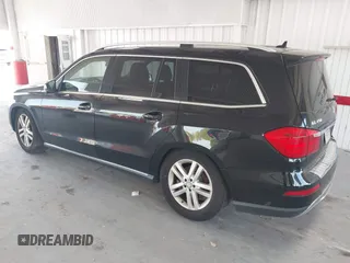 2014 Mercedes-Benz GL 450 z VIN 4JGDF7CE7EA435479, wystawiony jako IAAI lot #42280243 z przebiegiem 138 930 mil mil oraz . Historia ofert i sprzedaży dostępna na DreamBid. Obrazek 3.