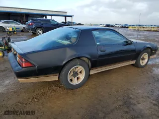 1984 Chevrolet Camaro Z28 Sport with VIN 1G1AP87G7EL175104, listed as a Copart auction lot 86895534 with 27,874 mi miles and Salvage Title. Bid and sale history available at carsss.com. Image 3.