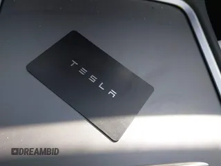 2023 Tesla Model Y Performance z VIN 7SAYGDEF6PF774965, wystawiony jako IAAI lot #41655550 z przebiegiem 33 824 mil mil oraz . Historia ofert i sprzedaży dostępna na DreamBid. Obrazek 11.