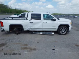 2014 GMC Sierra 1500 Denali z VIN 3GTP1WEC3EG421005, wystawiony jako IAAI lot #41936295 z przebiegiem 188 918 mil mil oraz . Historia ofert i sprzedaży dostępna na DreamBid. Obrazek 13.