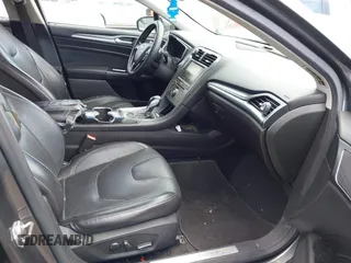 2015 Ford Fusion Titanium with VIN 3FA6P0K96FR283763, listed as a IAAI auction lot 42046868 with 104,542 mi miles. Bid and sale history available at carsss.com. Image 5.