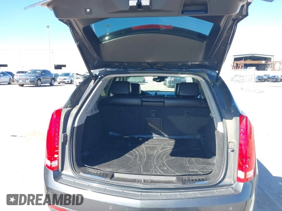 2013 Cadillac SRX Performance Collection with VIN 3GYFNDE38DS568561, listed as a IAAI auction lot 41701063 with 139,191 mi miles. Bid and sale history available at carsss.com. Image 17.