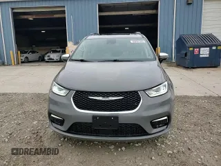 2023 Chrysler Pacifica Limited with VIN 2C4RC1GG0PR529598, listed as a Copart auction lot 55287345 with 65,714 mi miles and Salvage title. Bid and sale history available at DreamBid. Image 14.