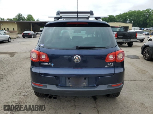 2011 Volkswagen Tiguan SEL z VIN WVGBV7AX2BW534482, wystawiony jako Copart lot #61097265 z przebiegiem 186 282 mil mil oraz Czysty tytuł • Clean title. Historia ofert i sprzedaży dostępna na DreamBid. Obrazek 6.