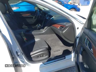 2016 Cadillac CTS with VIN 1G6AR5SS1G0112728, listed as a IAAI auction lot 41830547 with 100,610 mi miles and . Bid and sale history available at DreamBid. Image 5.