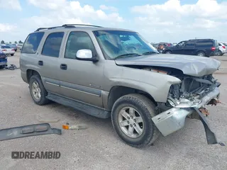 2002 Chevrolet Tahoe LS z VIN 1GNEC13V22R206341, wystawiony jako IAAI lot #42436560 z przebiegiem 271 904 mil mil oraz . Historia ofert i sprzedaży dostępna na DreamBid. Obrazek 1.