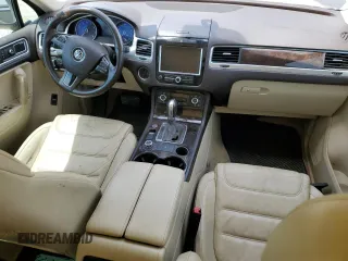 2013 Volkswagen Touareg Lux with VIN WVGEF9BP8DD002947, listed as a Copart auction lot 52590164 with 144,831 mi miles and Salvage Title. Bid and sale history available at DreamBid. Image 8.
