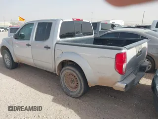 2014 Nissan Frontier SV with VIN 1N6AD0ER0EN759772, listed as a IAAI auction lot 41479252 with 153,630 mi miles and . Bid and sale history available at DreamBid. Image 3.