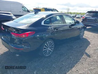 2021 BMW 2 Series 228i xDrive with VIN WBA73AK08M7J51154, listed as a IAAI auction lot 42168185 with 52,167 mi miles and . Bid and sale history available at DreamBid. Image 4.