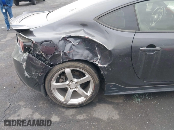 2014 Scion FR-S z VIN JF1ZNAA1XE8707577, wystawiony jako IAAI lot #42054339 z przebiegiem 95 241 mil mil oraz . Historia ofert i sprzedaży dostępna na DreamBid. Obrazek 6.