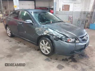 2005 Acura TSX with VIN JH4CL96865C021624, listed as a IAAI auction lot 41857232 with 212,920 mi miles. Bid and sale history available at carsss.com. Image 1.