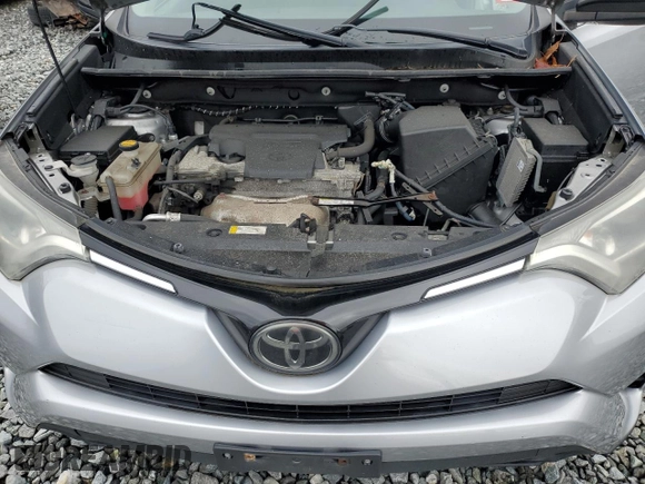 2017 Toyota RAV4 LE z VIN 2T3BFREVXHW547834, wystawiony jako Copart lot #57886525 z przebiegiem 97 586 mil mil oraz Szkoda całkowita • Salvage title. Historia ofert i sprzedaży dostępna na DreamBid. Obrazek 12.