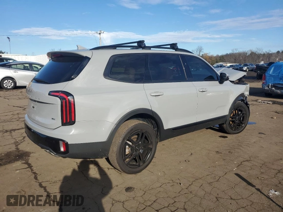 2024 Kia Telluride EX X-Line z VIN 5XYP3DGC5RG439067, wystawiony jako Copart lot #87198444 z przebiegiem 11 151 mil mil oraz Szkody całkowita. Historia ofert i sprzedaży dostępna na DreamBid. Obrazek 3.