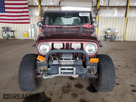 2003 Jeep Wrangler Sahara with VIN 1J4FA59S03P336844, listed as a Copart auction lot 49290345 with 167,726 mi miles and Salvage title. Bid and sale history available at DreamBid. Image 5.
