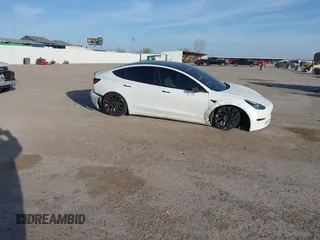 2023 Tesla Model 3 Performance z VIN 5YJ3E1EC5PF689620, wystawiony jako IAAI lot #41814112 z przebiegiem Nie podano mil oraz . Historia ofert i sprzedaży dostępna na DreamBid. Obrazek 6.
